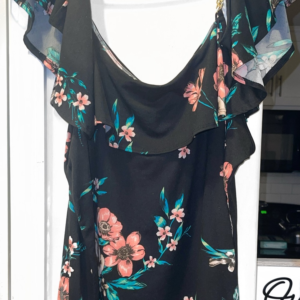 Off the shoulder floral blouse.